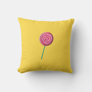 Gedrehter roter Lutscher mit Rosa Kissen