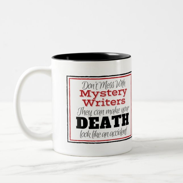 Geheimnis-Verfasser-warnende Tasse (Links)