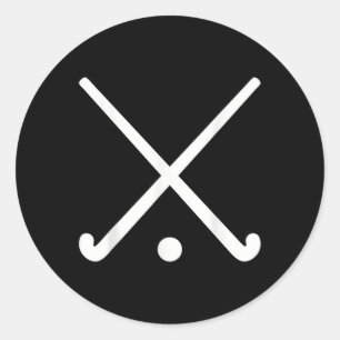 Gekreuzte Field-Hockeyschläger Runder Aufkleber