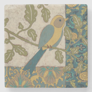 Gelb und aquamariner blauer Vogel gehockt auf Steinuntersetzer