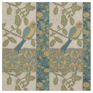 Gelb und aquamariner blauer Vogel gehockt auf Stoff