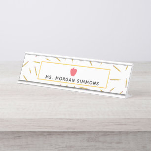 Gelb zeichnet rosa Apple-Lehrer-Nummernschild an Schreibtischnamensplakette