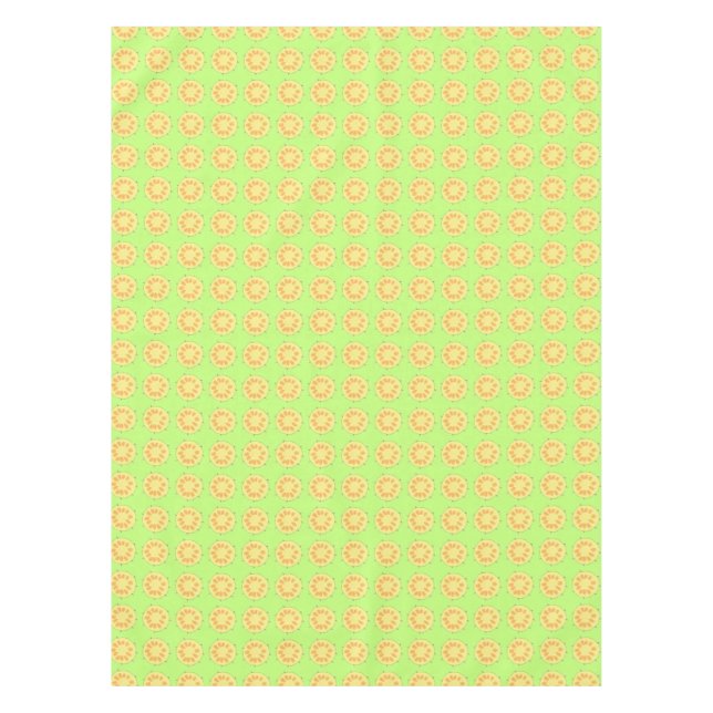Gelbe Ananas in Scheiben auf grünen Tischdecken (Vorderseite)