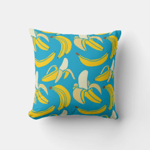 Gelbe Bananen, blaues Hintergrundmuster Kissen