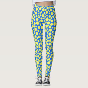 Gelbe Erbsen auf himmelblauem Hintergrund Leggings