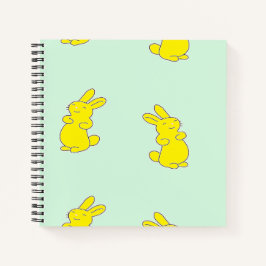 Gelbe Happy Bands auf aquamarinen Notizbuch