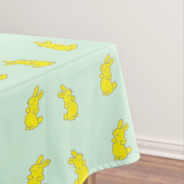 Gelbe Happy Bands auf aquamarinen Tischdecke