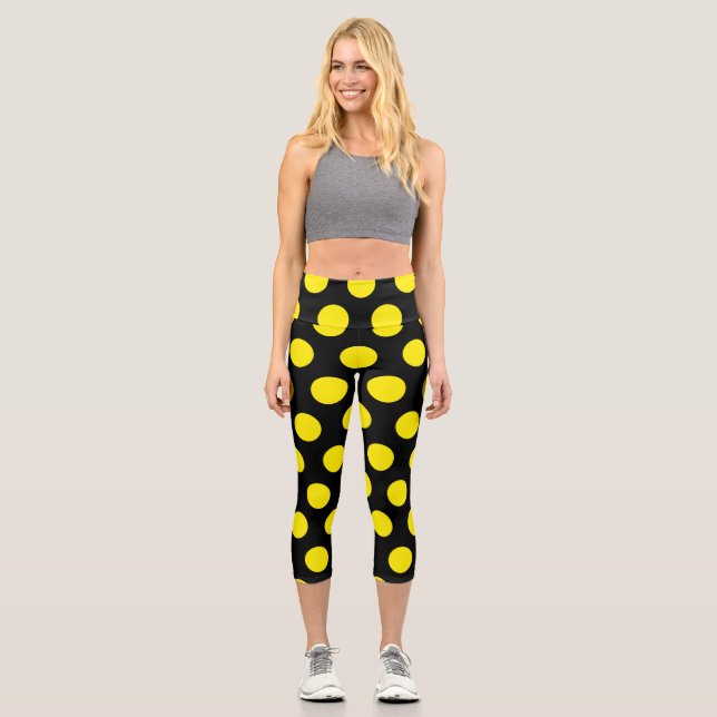 Gelbe Kreise mit schwarzem Hintergrund Capri Leggings (Vorderseite)