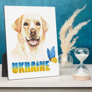 Gelbe Labrador und Schmetterling in der Ukraine Fotoplatte