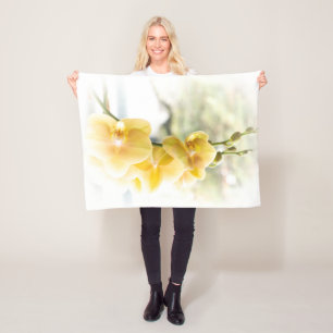Gelbe Moth Orchid im Sonnenschein Fleecedecke
