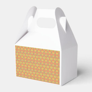 Gelbe, orange und braune Geschenkpapierbögen ar Geschenkschachtel