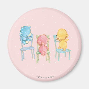 Gelbe, rosa und blaue Bären auf Stühlen Magnet