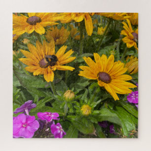 Gelbe Rudbeckia-Blume Rosa Phlox und Biene Puzzle