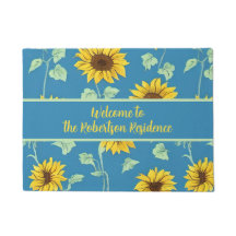 Gelbe Sonnenblumen, grüne Blätter, blauer Hintergr