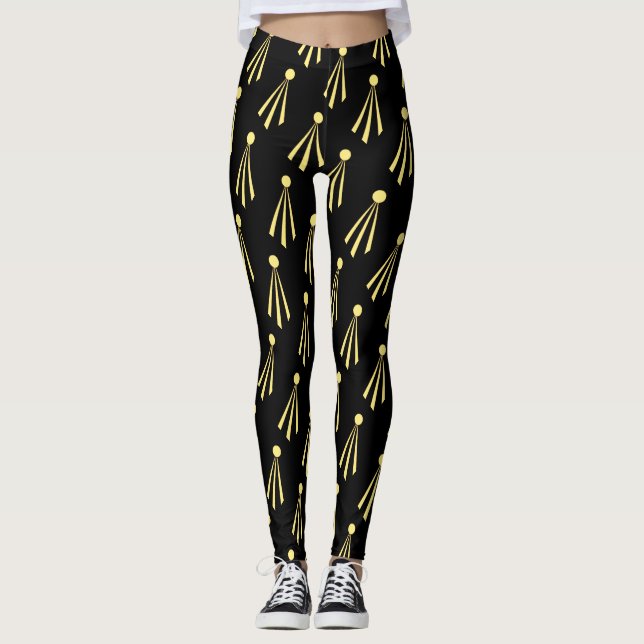 Gelbe Sonnenstrahlen Muster auf schwarz Leggings (Vorderseite)