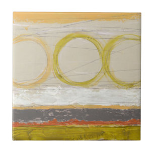 Gelbe u. orange Kreise auf mehrfarbigem Fliese