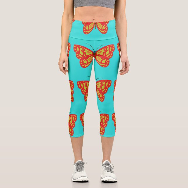 Gelbe und orangefarbene Schmetterlinge Capri Leggings (Vorderseite)