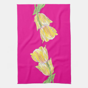 Gelbe und rosa Tulpen auf einem lebendigen rosa Kü Geschirrtuch