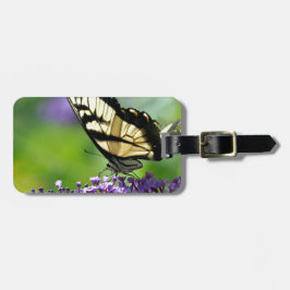 Gelbe und schwarze Schmetterling auf Lavendel Gepäckanhänger