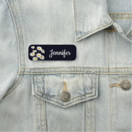 Gelbe und weiße Milchsorten auf schwarz Namensschild