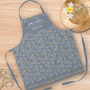 Gelbe Wildblume Muster auf schiefer Blau Schürze