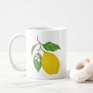 Gelbe Zitrone mit grünen Blätter und weißer Blume Kaffeetasse