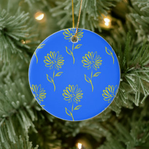Gelber Blumenumriss auf blauem Hintergrund Keramik Ornament