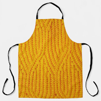 Gelber gestrickter Untergrund aus Spinnstoffen Schürze