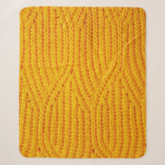 Gelber gestrickter Untergrund aus Spinnstoffen Sherpadecke