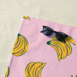 Gelber Pop Art Banana Muster auf rosa Hintergrund Strandtuch