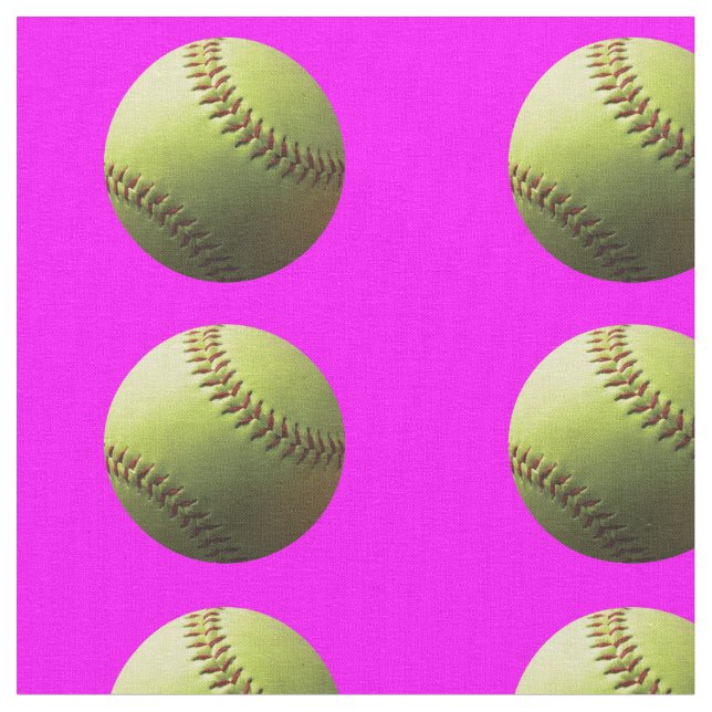 Gelber Softball auf Rosa Stoff (Nahaufnahme)