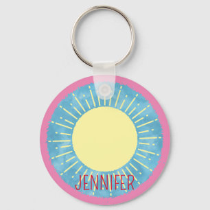 Gelber Sonnenschein im Individuelle Name mit blaue Schlüsselanhänger
