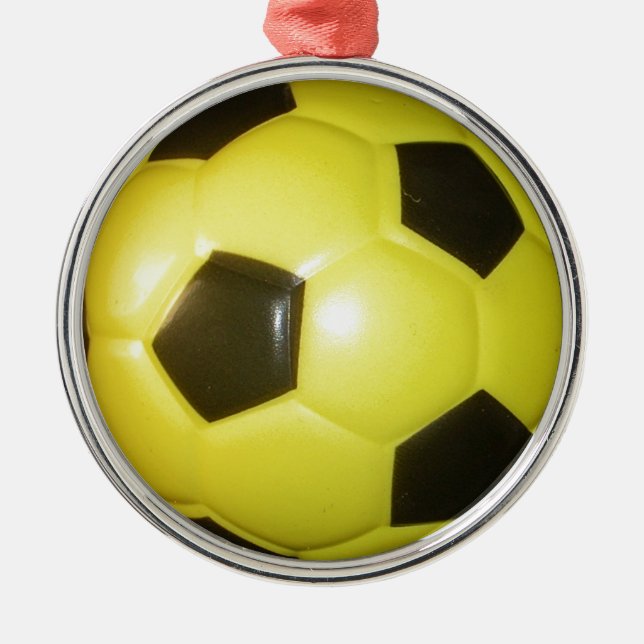 Gelber und schwarzer Fußball. Ornament Aus Metall (Vorne)