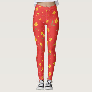 Gelbes Blumenmuster auf Rot Leggings