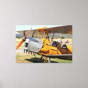 Gelbes Doppeldecker-Flugzeug Tiger Moth Leinwanddruck