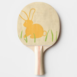 Gelbes Häschen und grünes Gras durch Chariklia Tischtennis Schläger