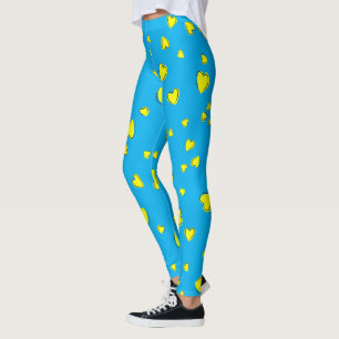Gelbes Herzmuster auf blau Leggings
