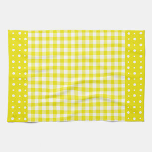 Gelbes Küchentuch mit Tupfen und Gingham-Karomuste