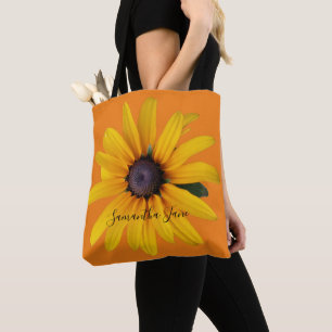 Gelbes schwarz-Mit Augen Susan Blume Foto Orange