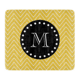 Gelbes Zickzack schwarzes Monogramm des Muster-  Schneidebrett