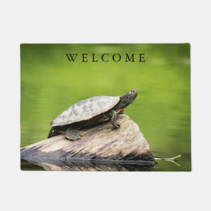 Gemalte Schildkröte auf einem Klotz Fußmatte