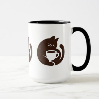 Gemütliche Katze und Kaffeetasse
