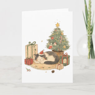 Gemütliche Weihnachtskatze mit Geschenken und Weih Karte