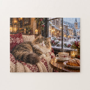Gemütliche Winterkatze, die drinnen mit einem schn Puzzle