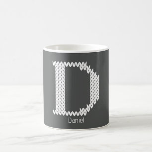 Gemütlicher gestrickter Alphabetbuchstabe D Kaffeetasse