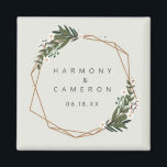 Geometric Gold Boho Greenery Gastgeschenk Hochzeit Magnet<br><div class="desc">Moderner boho Gastgeschenk Hochzeit Magnet mit Ihren Namen und Datum in einem goldgeometrischen Rahmen umgeben von Grün und weißen Blume. Ein botanisches Design, das sich perfekt für eine böhmische Feier im Sommer eignet. Diese Magnete machen große Gastgeschenke Hochzeiten, die Ihre Gäste gewollt werden, um behalten. Rahmen mit freundlicher Genehmigung von:von...</div>