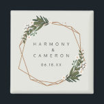Geometric Gold Boho Greenery Gastgeschenk Hochzeit Magnet<br><div class="desc">Moderner boho Gastgeschenk Hochzeit Magnet mit Ihren Namen und Datum in einem goldgeometrischen Rahmen umgeben von Grün und weißen Blume. Ein botanisches Design, das sich perfekt für eine böhmische Feier im Sommer eignet. Diese Magnete machen große Gastgeschenke Hochzeiten, die Ihre Gäste gewollt werden, um behalten. Rahmen mit freundlicher Genehmigung von:von...</div>