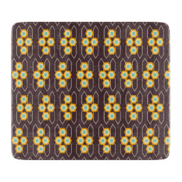 Geometric pattern with orange and blue hexagons schneidebrett