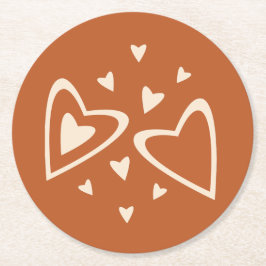 Geometrie in Liebe - Creme auf rotem Ocker - Bild. Runder Pappuntersetzer