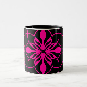 Geometrische Blume im heißen Rosa und im Schwarze Zweifarbige Tasse